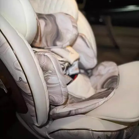 Asiento de seguridad premium para bebés: sistema de viaje Safety First con arnés de 5 puntos