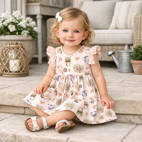 Vestido de bebé niña con estampado de pétalos – Vestido de jardín con bambú y ojales