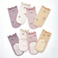 Novedad - Little Wonder Things - Orgánico - 4 pares de calcetines antideslizantes para bebés y niños pequeños