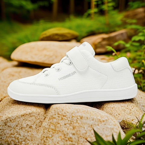 Zapatos casuales sin cordones para niños con suelas suaves antideslizantes.