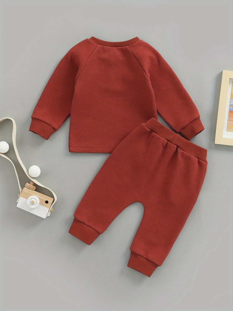 Conjunto de ropa gruesa tipo gofre para niños y niñas con botones redondos