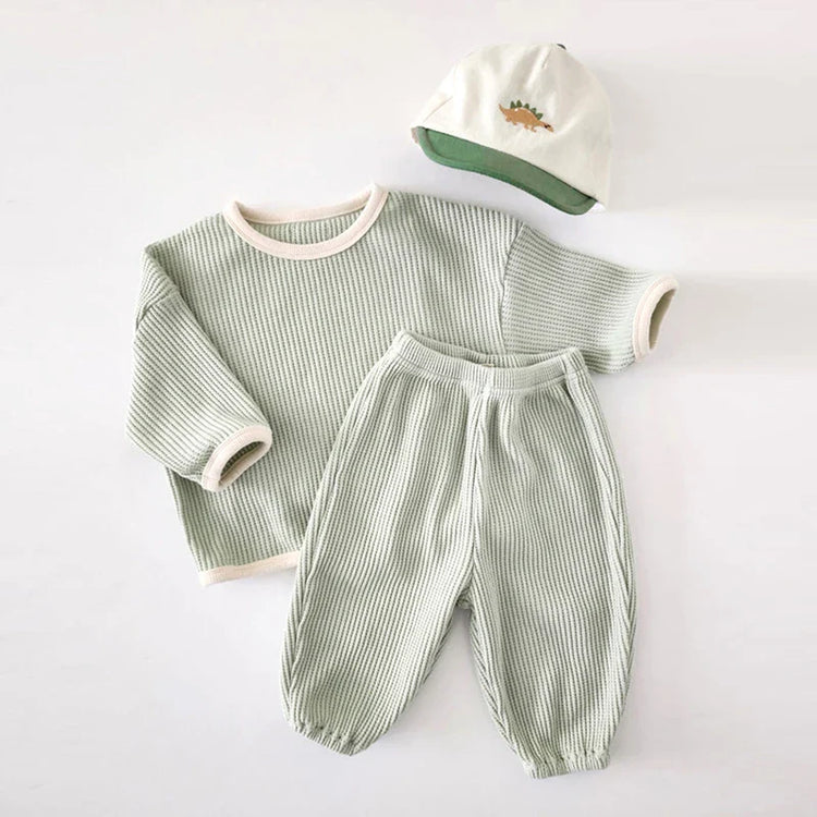 Conjunto de 2 piezas de jersey de algodón gofre de manga larga con cuello redondo y pantalones deportivos para bebés y niñas