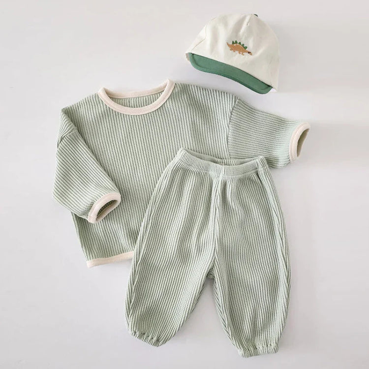 Conjunto de 2 piezas de jersey de algodón gofre de manga larga con cuello redondo y pantalones deportivos para bebés y niñas